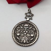 "Hidden Faces" French Renaissance Revival pendant