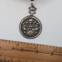 "Hidden Faces" French Renaissance Revival pendant