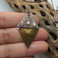 Copper and brass all seeing eye earrings