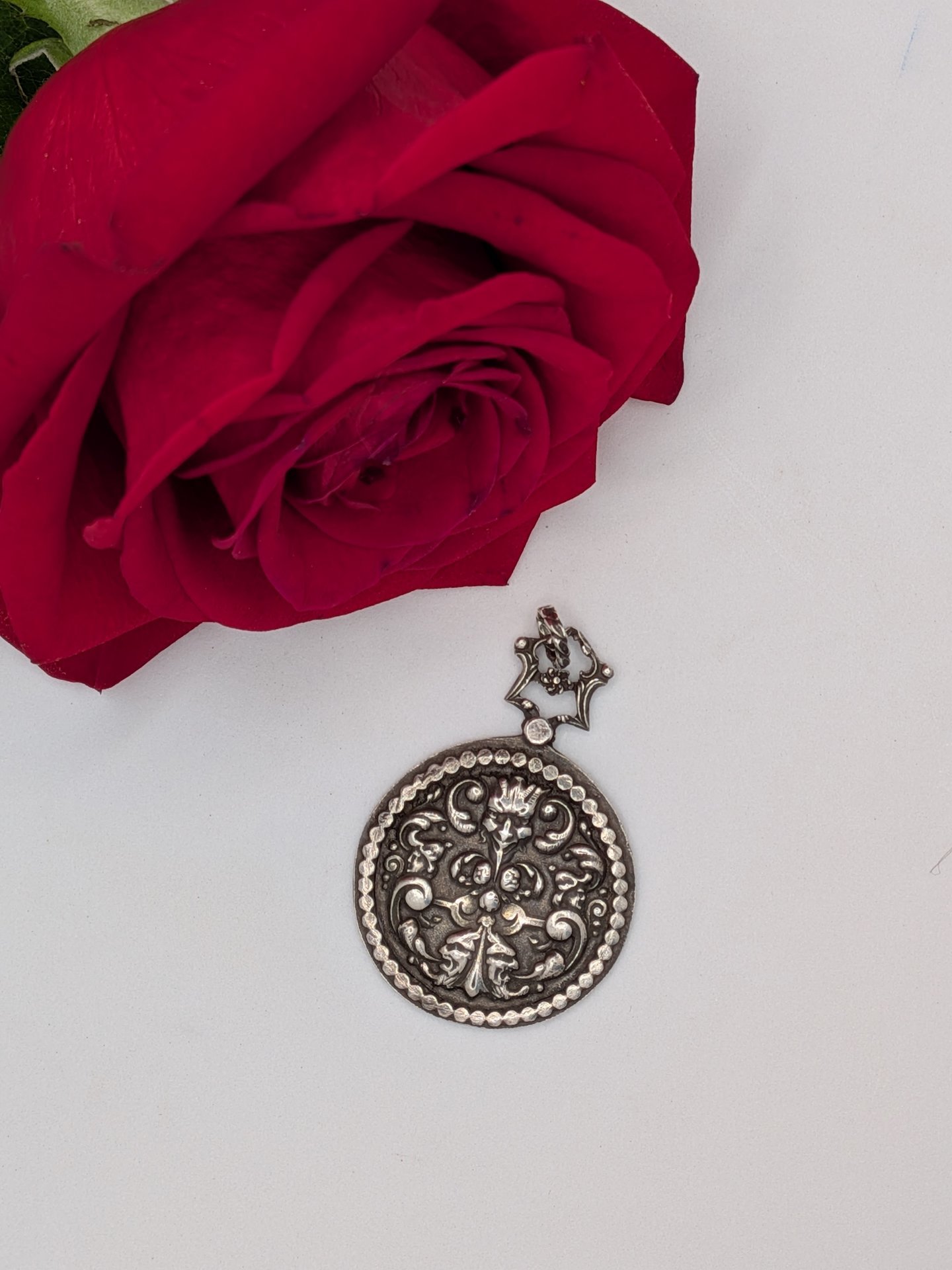 "Hidden Faces" French Renaissance Revival pendant