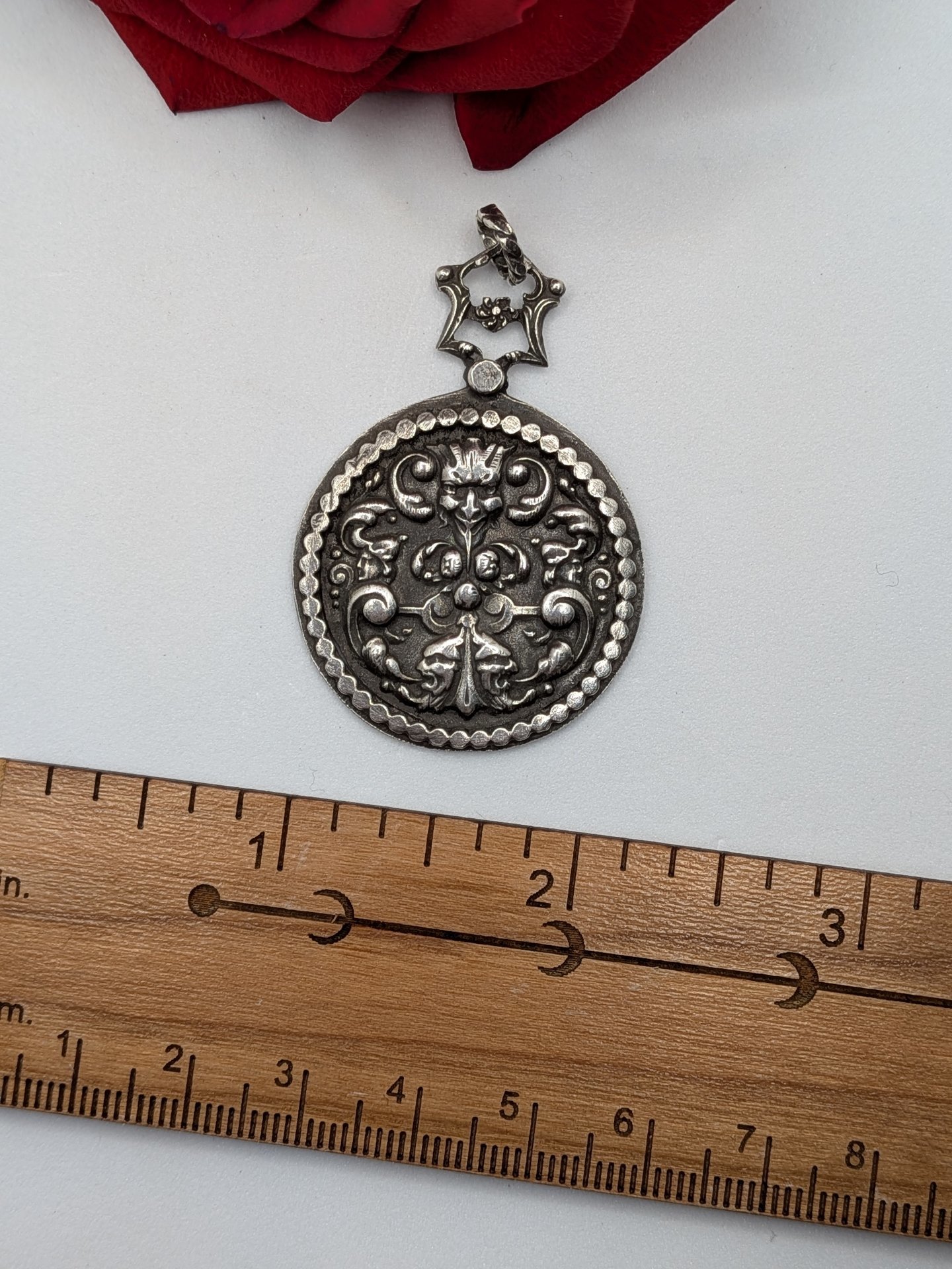 "Hidden Faces" French Renaissance Revival pendant