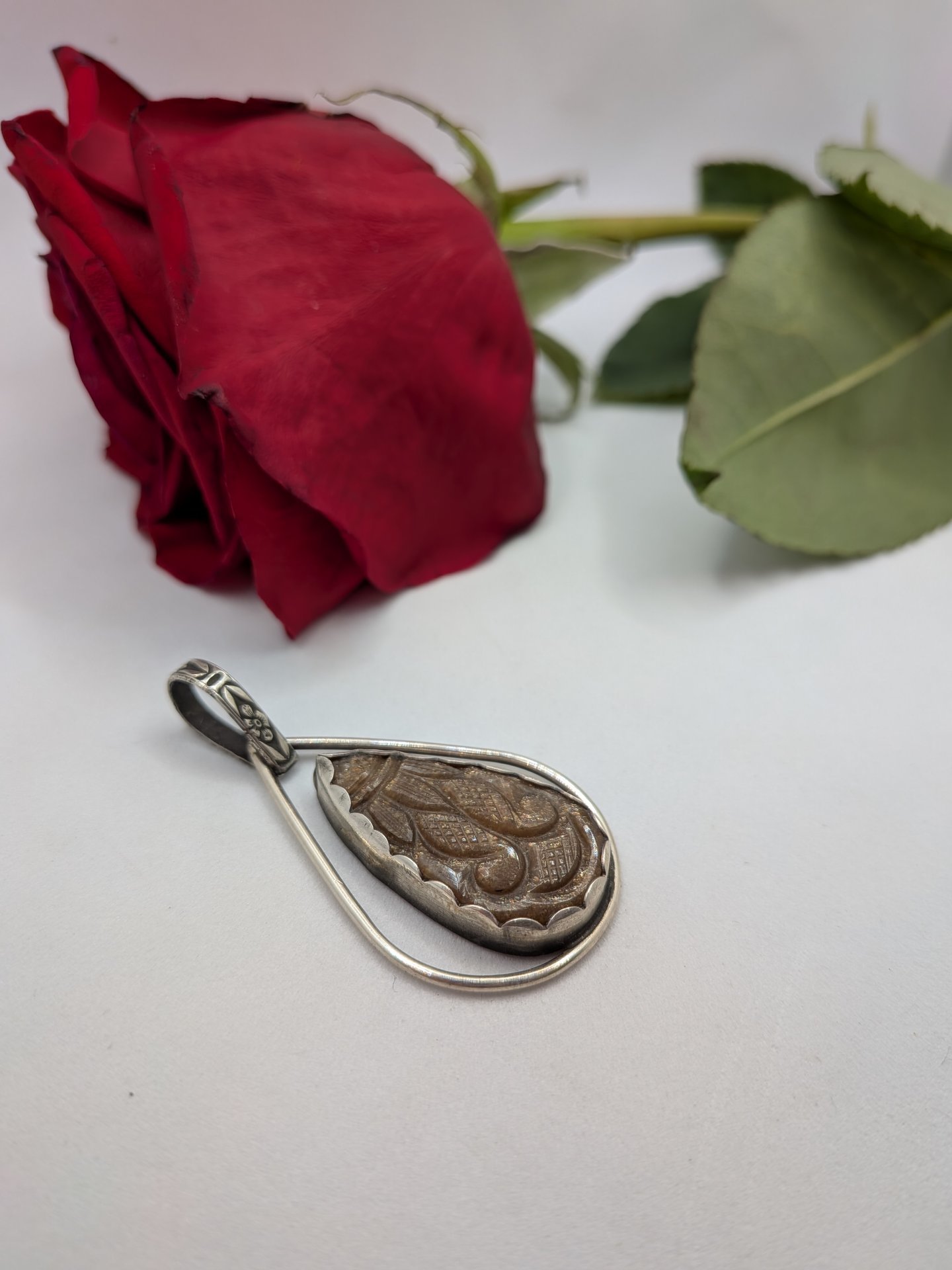 Carved Peach Sunstone Pendant 